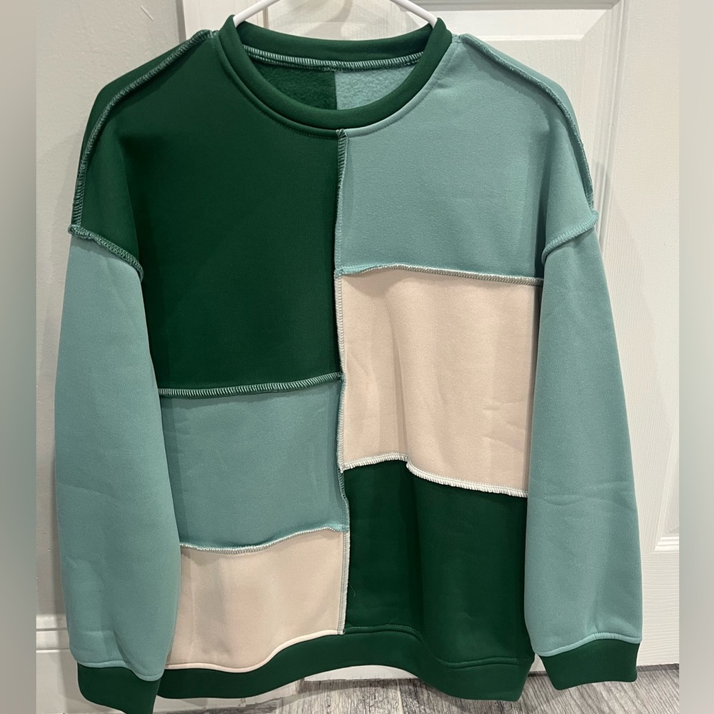 Green stitched sweatshirt